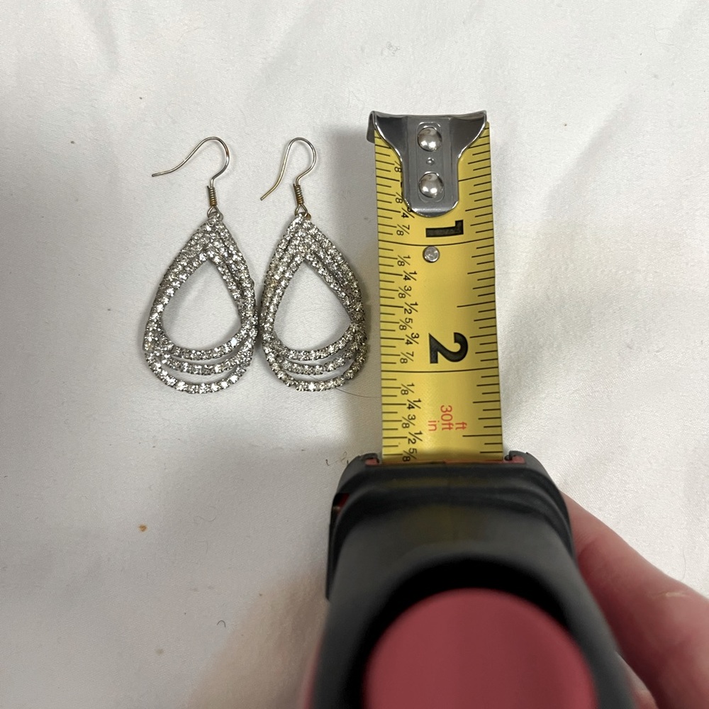 Earrings: rope style rhinestones swooped into a pear shape